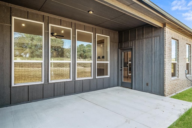 doorway to property featuring a patio area