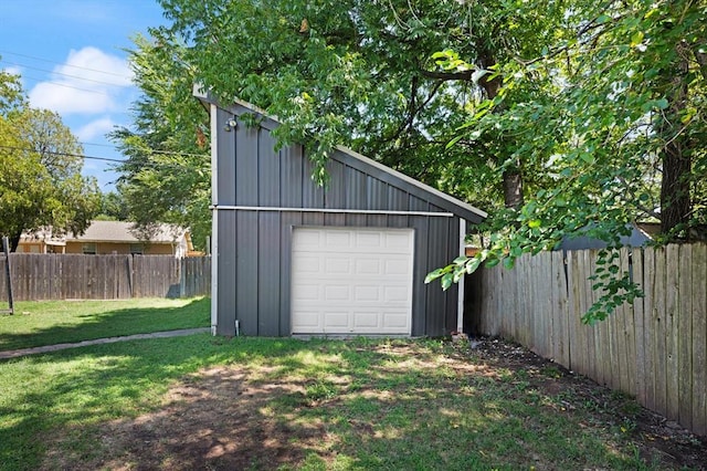 garage with a lawn