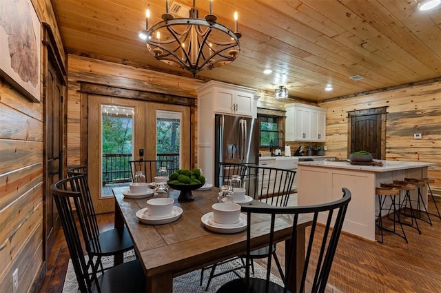 453 Bear Pine Trl, Broken Bow, OK 74728 - dining area featuring wood ceiling, wood walls, a chandelier, french doors, and recessed lighting