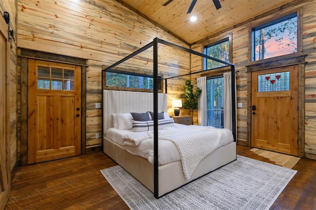 bedroom with wood ceiling, wooden walls, high vaulted ceiling, and dark wood-type flooring