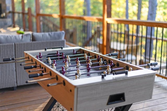 wooden terrace with outdoor lounge area