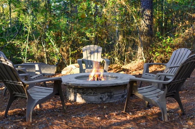 453 Bear Pine Trl, Broken Bow, OK 74728 - view of patio with a fire pit