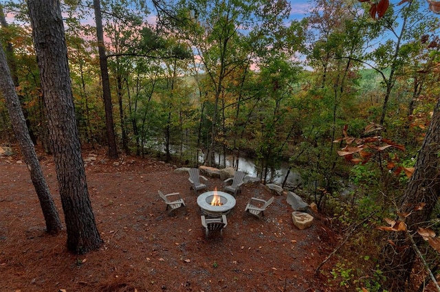 453 Bear Pine Trl, Broken Bow, OK 74728 - view of yard featuring an outdoor fire pit