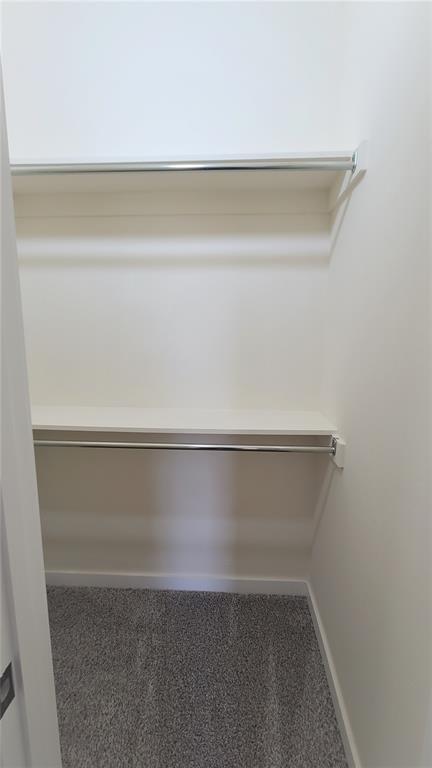 108 Tralee Ct, Yukon, OK 73099 - walk in closet with carpet floors