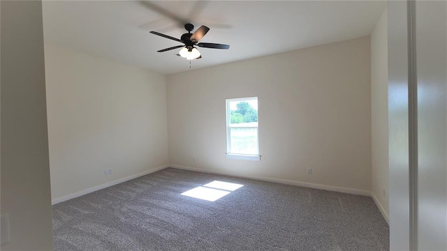 unfurnished room featuring carpet and ceiling fan