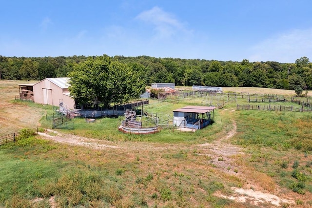 birds eye view of property featuring a rural view