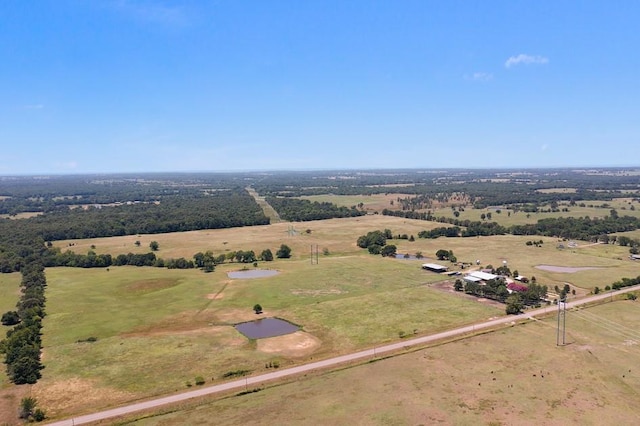 birds eye view of property featuring a rural view