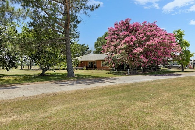 view of front of house with a front lawn