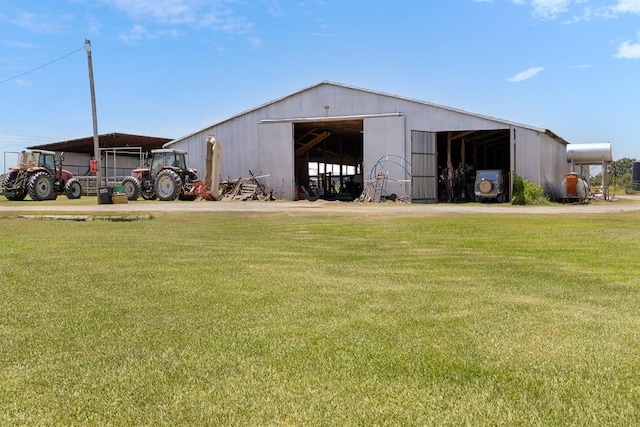 view of outbuilding with a lawn