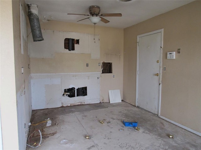 interior space featuring ceiling fan