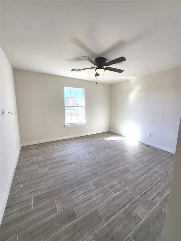 empty room with ceiling fan