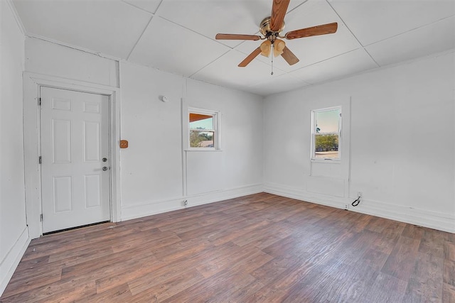 unfurnished room with hardwood / wood-style floors and ceiling fan