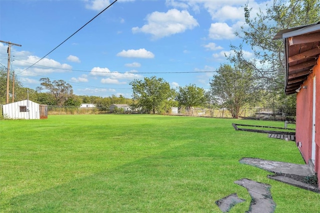 view of yard with a shed