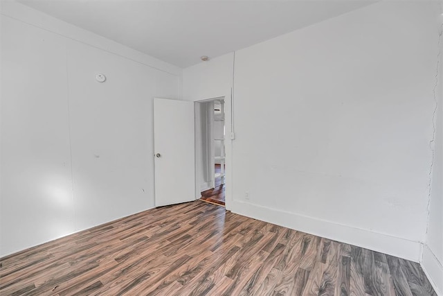 empty room featuring hardwood / wood-style floors