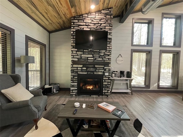 living room with hardwood / wood-style floors, wood ceiling, and vaulted ceiling