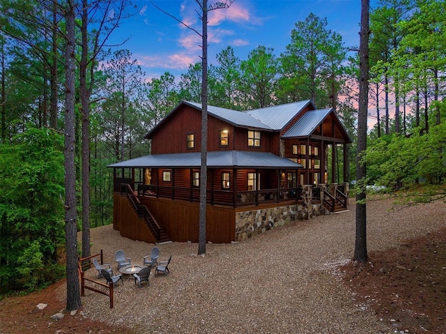 exterior space with a fire pit