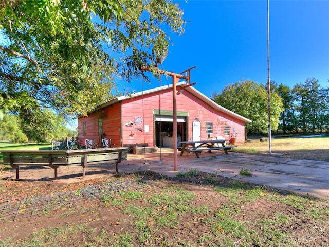 rear view of house with a patio