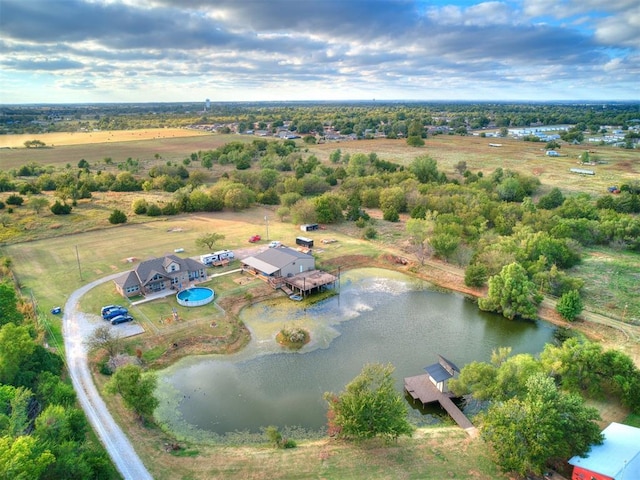 bird's eye view featuring a water view and a rural view