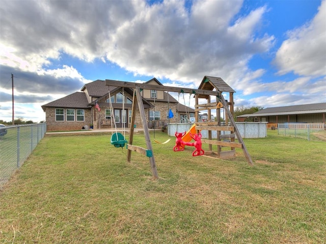 view of jungle gym featuring a yard