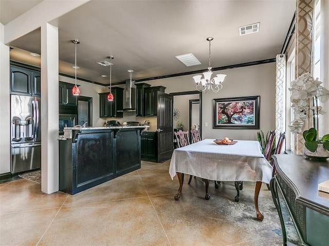 dining space with a chandelier and crown molding