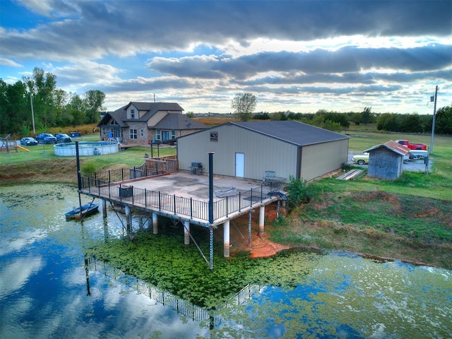 dock area with a deck with water view