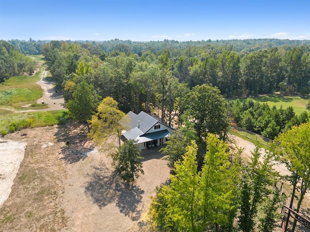 birds eye view of property with a rural view