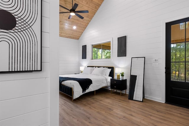 bedroom featuring hardwood / wood-style flooring, high vaulted ceiling, ceiling fan, and wood ceiling