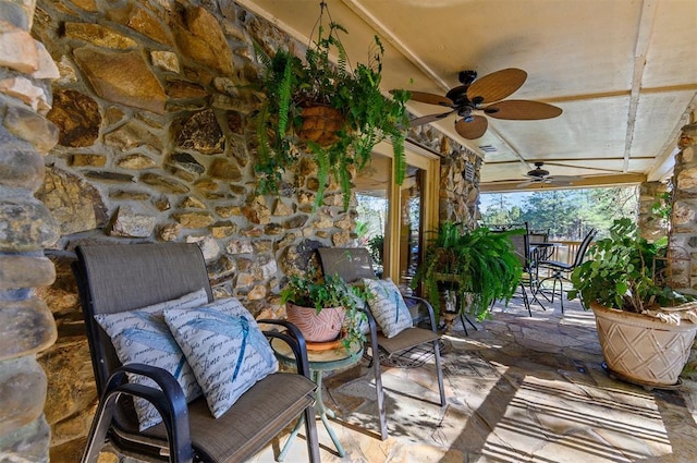 view of patio / terrace featuring ceiling fan