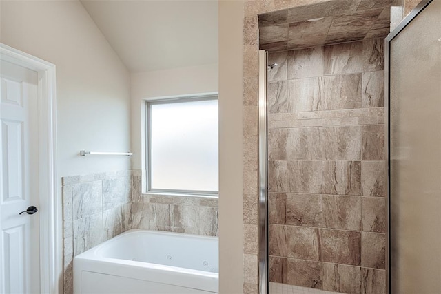 bathroom with separate shower and tub