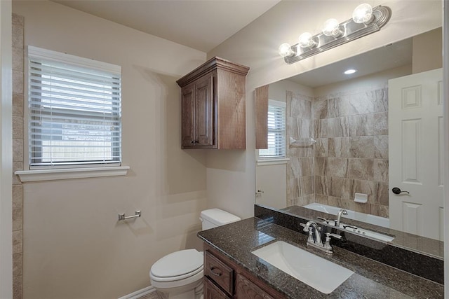 bathroom with vanity and toilet