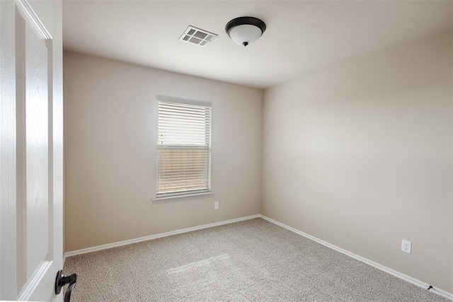 empty room featuring carpet