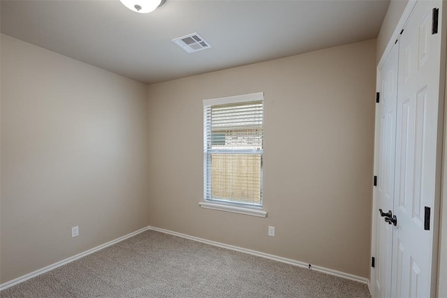 view of carpeted empty room