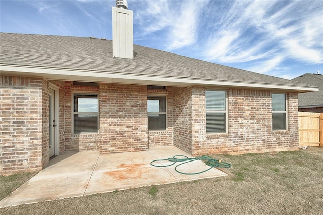 back of house with a patio area