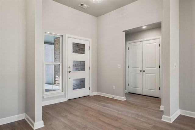 foyer entrance featuring light wood-type flooring