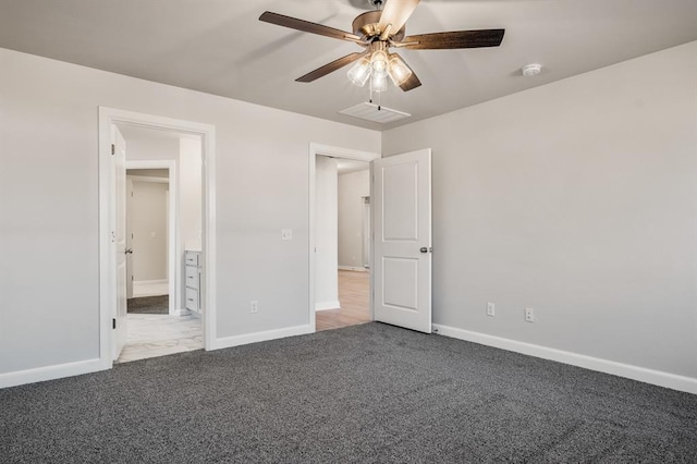 unfurnished bedroom with ceiling fan and carpet floors