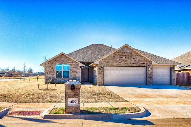 single story home with a garage