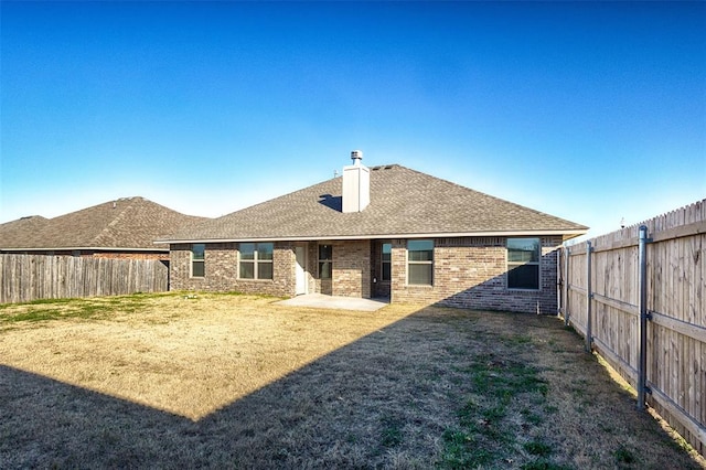 back of house featuring a patio area