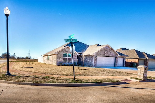 view of front of property with a garage