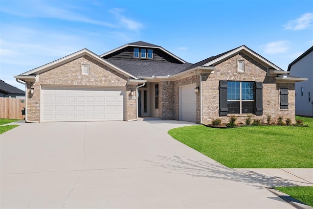 craftsman-style house with a garage and a front yard