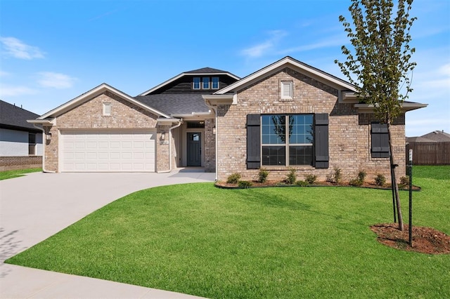 craftsman inspired home featuring a garage and a front lawn