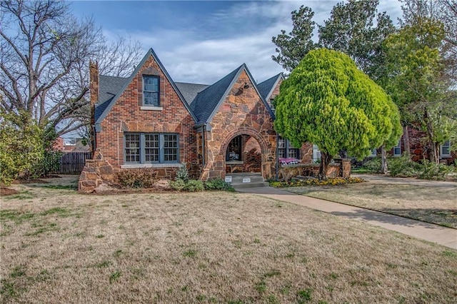 tudor house with a front lawn