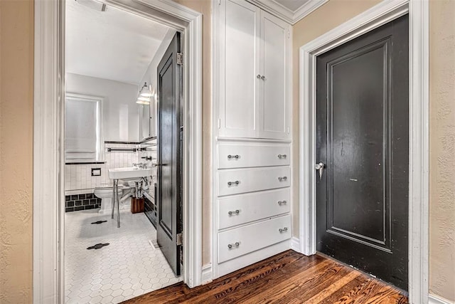 hallway featuring dark wood finished floors