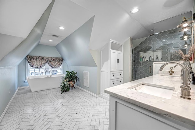 full bath with visible vents, a shower stall, vanity, and vaulted ceiling