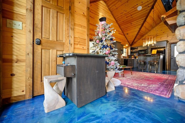 misc room featuring wooden walls, high vaulted ceiling, wooden ceiling, and indoor bar