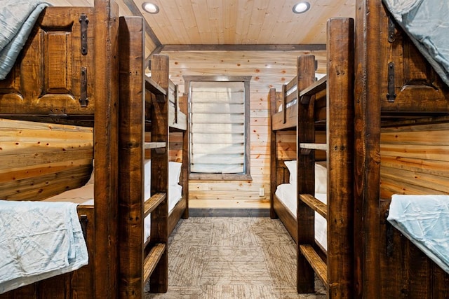 interior space with wooden ceiling and wooden walls