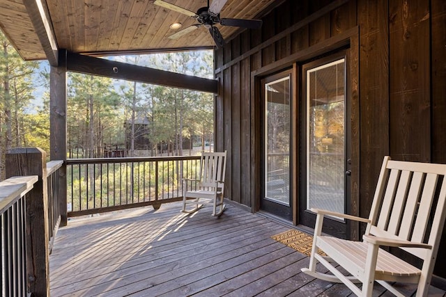 wooden deck with ceiling fan