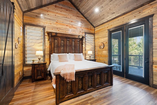 bedroom featuring light wood-type flooring, access to outside, wooden walls, and wood ceiling