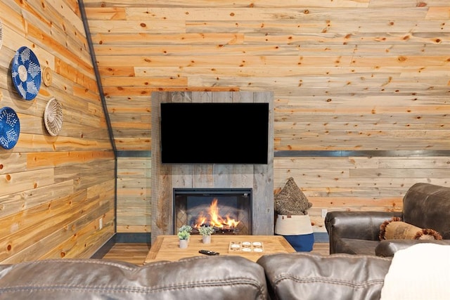 living room featuring wooden walls