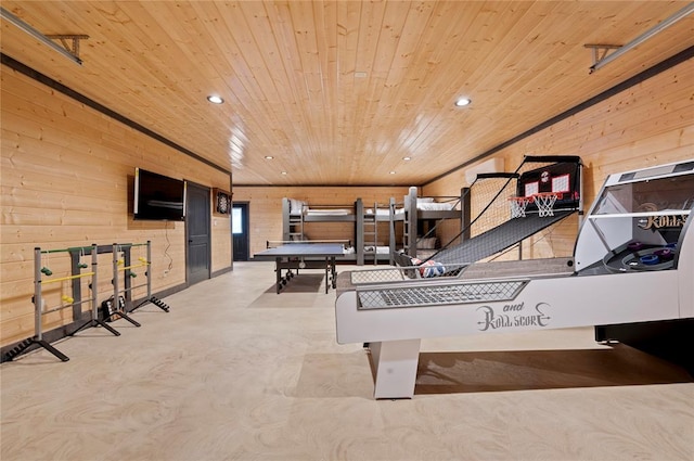 recreation room featuring wood walls and wooden ceiling