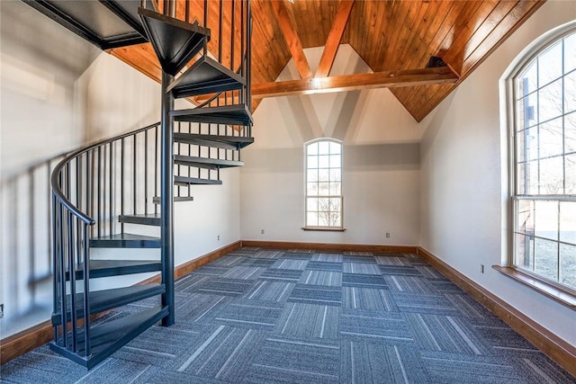 5900 N Choctaw Rd, Choctaw, OK 73020 - stairway featuring carpet floors, a wooden ceiling with exposed beams, plenty of natural light, and high vaulted ceiling